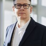 man wearing white dress shirt and black blazer